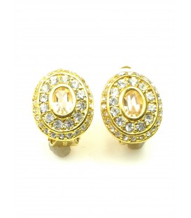 Ovale goudkleurige oorclip met strass steentjes