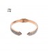 Rosegoudkleurige spang armband met punten aan de uiteinden en kleine steentjes