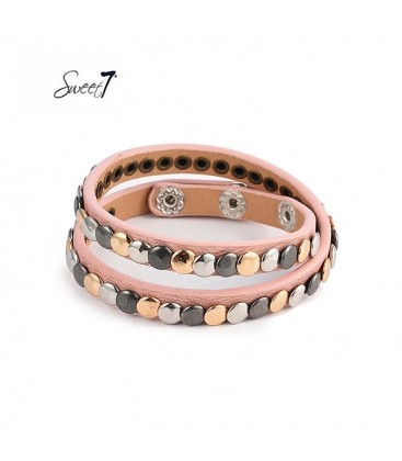 Armband van roze imitatieleer met kleine cirkeltjes