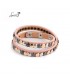 Armband van roze imitatieleer met kleine cirkeltjes