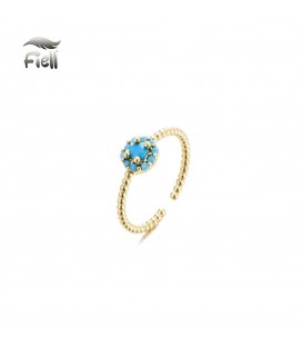 goudkleurige gedraaide ring met blauwe steentjes