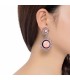 Helder roze oorclips met heldere strass en roze parelmoer inleg