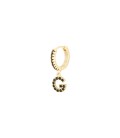 Goudkleurige oorbel met zwarte steentjes en hanger met de letter G
