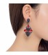 donker rode oorclips gemaakt van hars met kristal steentjes