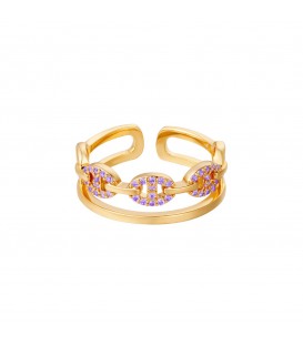 goudkleurige ring vergrendeld met paarse zirkoon steentjes