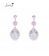 sweet 7,oorbellen,zilverkleurig,roze kraal,opengewerkte hanger,subtiel bling,elegante look.