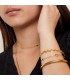 goudkleurige armband met witte geboortesteen april