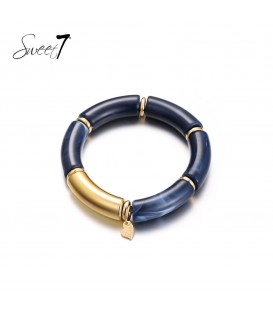 Blauwe armband met goudkleurige elementen
