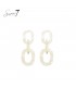 Beige oorhangers met motief