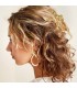 Goudkleurige haarclip met smiley vormen