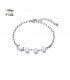 Zilverkleurige armband met 3 witte parels