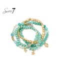 Turquoise armbanden met glaskralen en meerdere strengen
