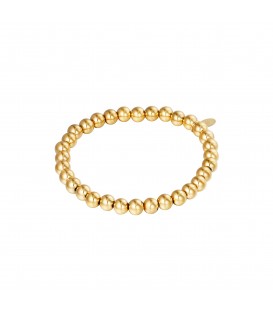 Goudkleurige armband van grote kralen