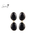 Oorbellen met dubbele zwarte cat eye stenen
