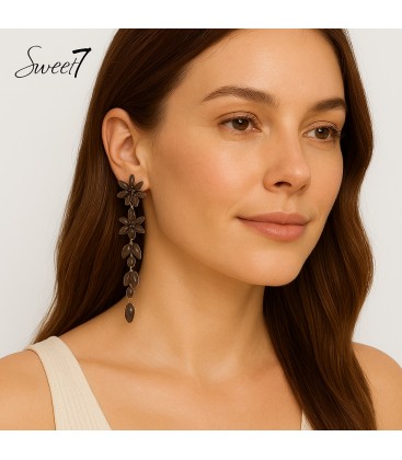 Oorbellen blauw met bloemdesign en bladstructuur