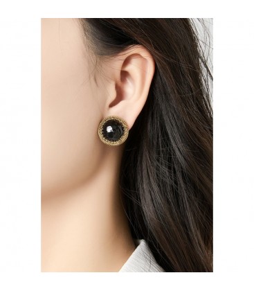 Oorclips met zwarte inleg en goudkleurige rand