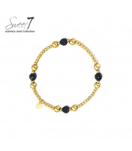 Goudkleurige armband met zwarte bolletjes