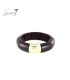 Armband bruin met een breed design en goudkleurig accent