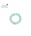 Armband met mintgroene hartjes en goudkleurige kralen