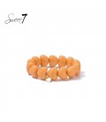 Armband met oranje hart kralen en goudkleurige detail
