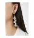 Oorclips met schelpjes, zeepaardje en parels en goudkleurige hangers