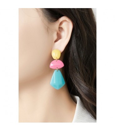 Oorclips met turquoise en okergeel met speelsevormen