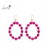 Oorbellen met fuchsia roze kralencirkel en goudkleurige details