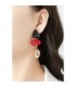 Oorclips met paarse en roze kralen en goudkleurig detail