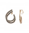 Oorclips bezet met zwarte en witte strass steentjes in een stijlvolle vorm